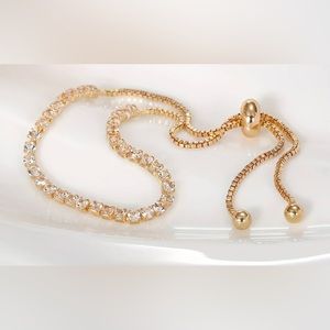 **Buy 4 Get 1 Free. $5 items only!  Gold Plated Adjustable Bracelet.